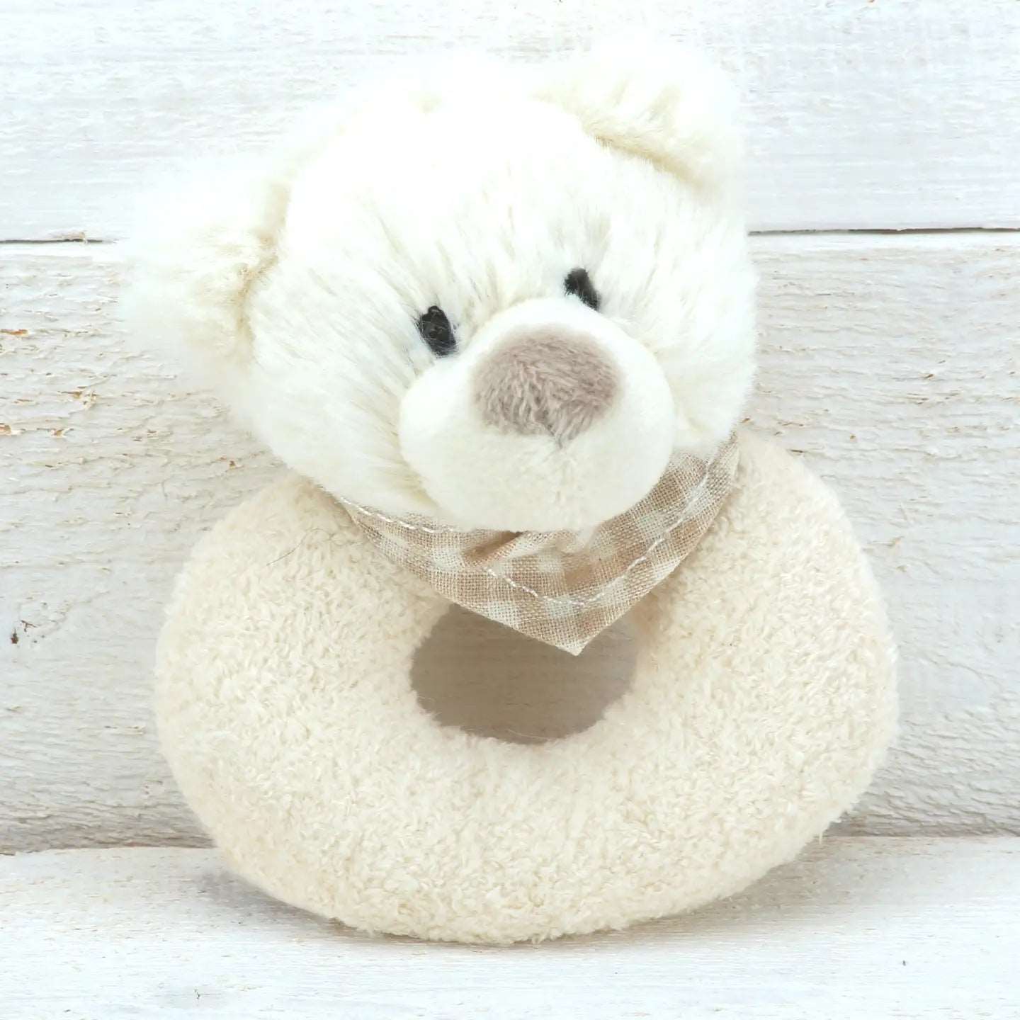 Adorable Jomanda stuffed bear toy with a charming bow, designed as a ring rattle for babies to enjoy. 