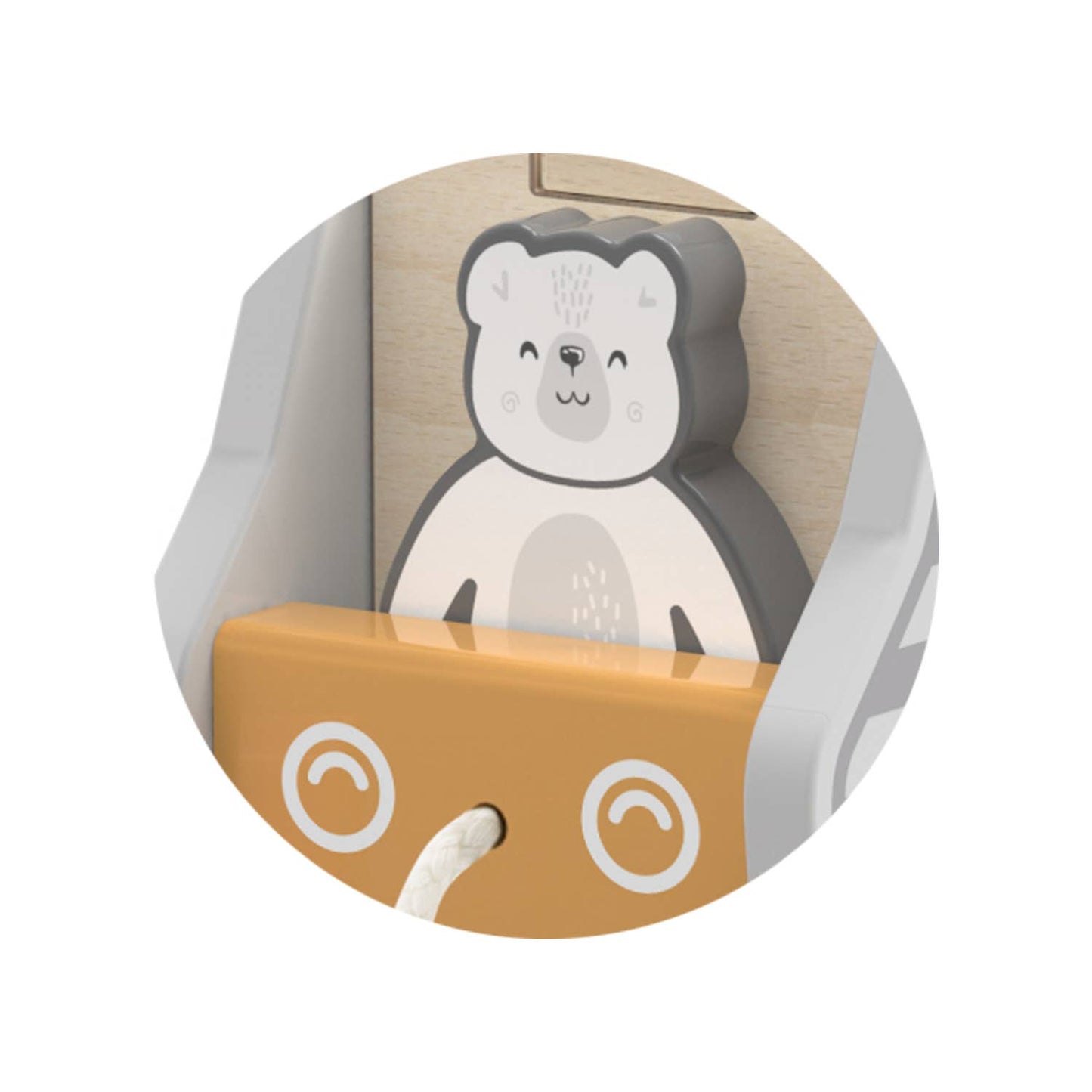 A wooden toy shape sorter made by PolarB designed as a pull-along truck. The truck features a cute bear illustration on the front and gray stripes along the sides. Various numbered blocks, including a star, triangle, and cylinder, are placed around the truck, each with a corresponding shape slot on the side for sorting. A string is attached to the front for pulling the toy.