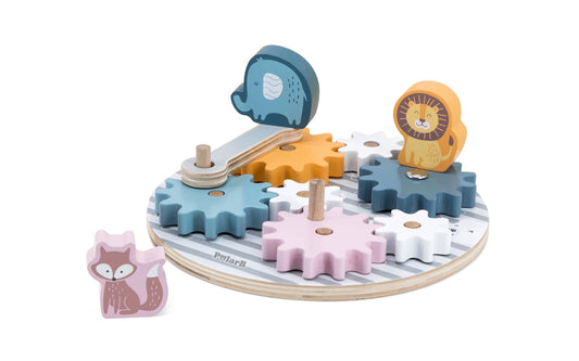 A wooden toy gear puzzle made by PolarB, featuring a circular base with colorful interlocking gears in shades of blue, yellow, pink, and white. The puzzle includes animal figures, such as a blue elephant, pink fox and an orange lion, which can be placed on top of the gears.